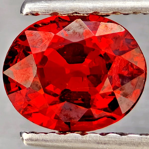Natural Orangish Red Spessartine Garnet Gemstones 0.86 Ct. Oval Shape 6.2 x 5.1 Mm.: Product ID: 802937260 Product Name: Natural Garnet Weight: 0.86 CT. Size: 6.2 x 5.1 x 3.3 MM. Shape: Oval Shape Color: Orangish Red Clarity:SI1 Luster: Good Gems Origin: Namibia Treatment: Unheated Cr
