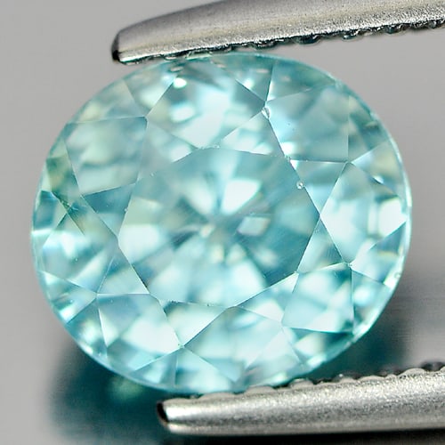 Natural Blue Zircon Gemstone 2.31 Ct. Oval Shape 7.4 x 6.6 Mm.: Product ID: 807720763 Product Name: Natural Zircon Weight: 2.31 CT. Size: 7.4 x 6.6 x 4.9 MM. Shape: Oval Color: Blue Clarity:SI Luster: Good Gems Origin: Cambodia Treatment: Heated Crystal Structure:
