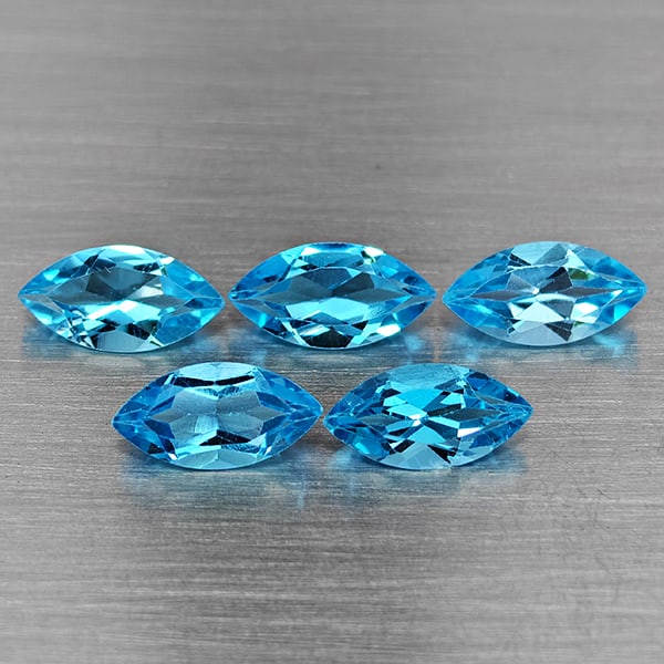 Natural Swiss Blue Topaz Gemstones 5.60 Ct. 5 Pcs. Marquise Shape 10.1 x 5.2 Mm.: Product ID: 807168717 Product Name: Natural Blue Topaz Weight: 5.60 CT. Size: 10.1 x 5.2 x 3.5 MM. Shape: Marquise Shape Color: Swiss Blue Clarity:VSI Luster: Good Gems Origin: Brazil Treatment: Treat