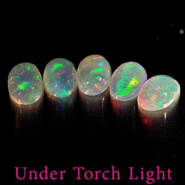 Natural Multi Color Opal 1.42 Ct. 5 Pcs. Oval Cabochon Shape 6.1 x 4.2 Mm.: Product ID: 818728134 Product Name: Natural Opal Weight: 1.42 CT. Size: 6.1 x 4.2 x 2.5 MM. Shape: Oval Cabochon Color: Multi-Color Clarity:Semi - Transparent Luster: Good Gems Origin: Ethiopia Treatm