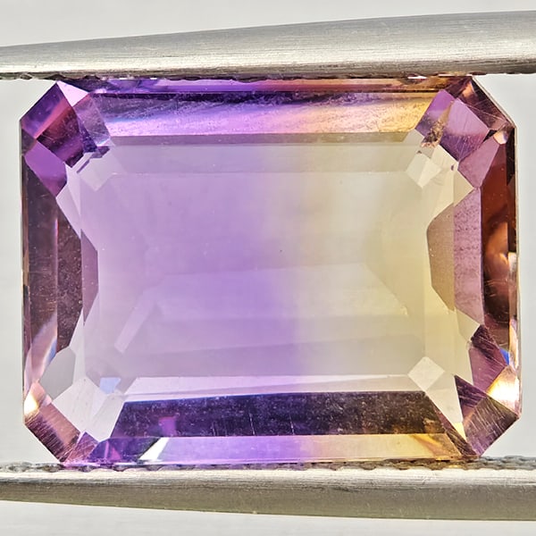 Natural Bi Color Ametrine Gemstones 5.42 Ct. Octagon Shape 12.6 x 9.8 Mm: Product ID: 800408636 Product Name: Natural Ametrine Weight: 5.42 CT. Size: 12.6 x 9.8 x 5.4 MM. Shape: Octagon Color: Bi Color Clarity:VSI Luster: Good Gems Origin: Bolivia Treatment: Unheated Crysta