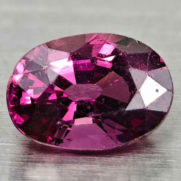 Natural Raspberry Rhodolite Garnet Gemstones Oval Shape 6.6 X 4.6 Mm.: Product ID: 102906836 Product Name: Natural Rhodolite Weight: 0.92 CT. Size: 6.6 X 4.6 X 3.5 MM. Shape: Oval Color: Raspberry Clarity:VSI Luster: Good Gems Origin: Madagascar Treatment: Unheated Cryst