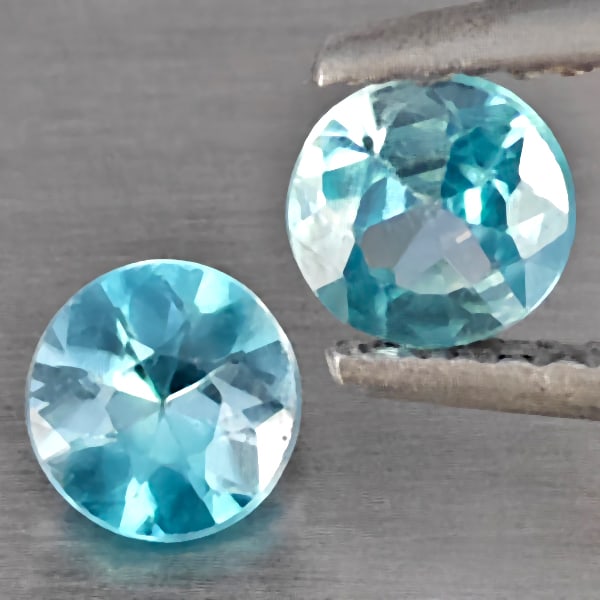 Natural Baby Blue Zircon Gemstones 1.00 Ct. 2 Pcs. Round Diamond Cut 4.7 Mm.: Product ID: 807743221 Product Name: Natural Zircon Weight: 1.00 CT. Size: 4.7 x 4.7 x 2.8 MM. Shape: Round Diamond Cut Color: Baby Blue Clarity:SI1 Luster: Good Gems Origin: Cambodia Treatment: Heated