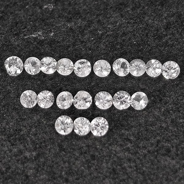 Natural White Sapphire Gemstones 0.90 Ct. 20 Pcs. Round Diamond Cut 2.2 Mm.: Product ID: 806162968 Product Name: Natural White Sapphire Weight: 0.90 CT. Size: 2.2 x 2.2 x 1.5 MM. Shape: Round Diamond Cut Color: White Clarity:VSI Luster: Good Gems Origin: Sri - Lanka Treatment: