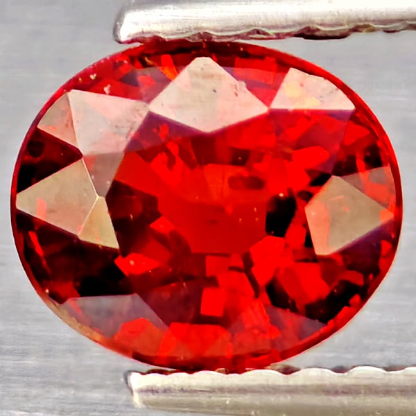 Natural Orangish Red Spessartine Garnet Gemstones 1.18 Ct. Oval Shape 6.8 x 5.4 Mm.: Product ID: 802937300 Product Name: Natural Garnet Weight: 1.18 CT. Size: 6.8 x 5.4 x 3.8 MM. Shape: Oval Shape Color: Orangish Red Clarity:SI1 Luster: Good Gems Origin: Namibia Treatment: Unheated Cr