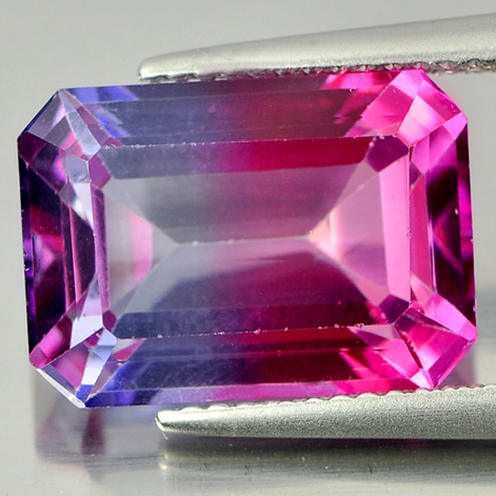 Natural Pure Pink Sky Blue Topaz Gemstones 9.41 Ct. Octagon Shape: Product ID: 807166494 Product Name: Natural Topaz Weight: 9.41 CT. Size: 14.1 x 10 x 6.9 MM. Shape: Octagon Color: Bi-Color Clarity:VVS Luster: Good Gems Origin: Brazil Treatment: Treated Crystal Stru