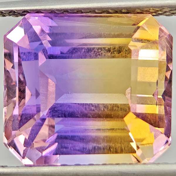 Natural Bi Color Ametrine Gemstones 6.13 Ct. Octagon Shape 10.8 x 9.7 Mm.: Product ID: 800408637 Product Name: Natural Ametrine Weight: 6.13 CT. Size: 10.8 x 9.7 x 8.1 MM. Shape: Octagon Color: Bi Color Clarity:VVS Luster: Good Gems Origin: Bolivia Treatment: Unheated Crysta