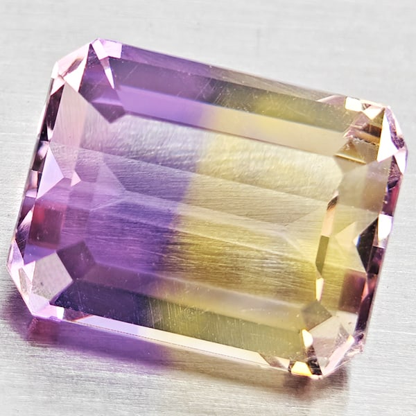 Natural Bi Color Ametrine Gemstones 2.87 Ct. Octagon Shape 8.2 x 8.2 Mm.: Product ID: 800408467 Product Name: Natural Ametrine Weight: 2.87 CT. Size: 8.2 x 8.2 x 5.8 MM. Shape: Octagon Shape Color: Bi Color Clarity:VSI Luster: Good Gems Origin: Bolivia Treatment: Unheated C