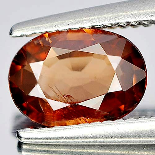 Natural Imperial Zircon Gemstones 0.95 Ct. Oval Shape 7.2 x 5.2 Mm.: Product ID: 807730594 Product Name: Natural Zircon Weight: 0.95 CT. Size: 7.2 x 5.2 x 2.4 MM. Shape: Oval Color: Imperial Clarity:SI1 Luster: Good Gems Origin: Cambodia Treatment: Heated Crystal Struc