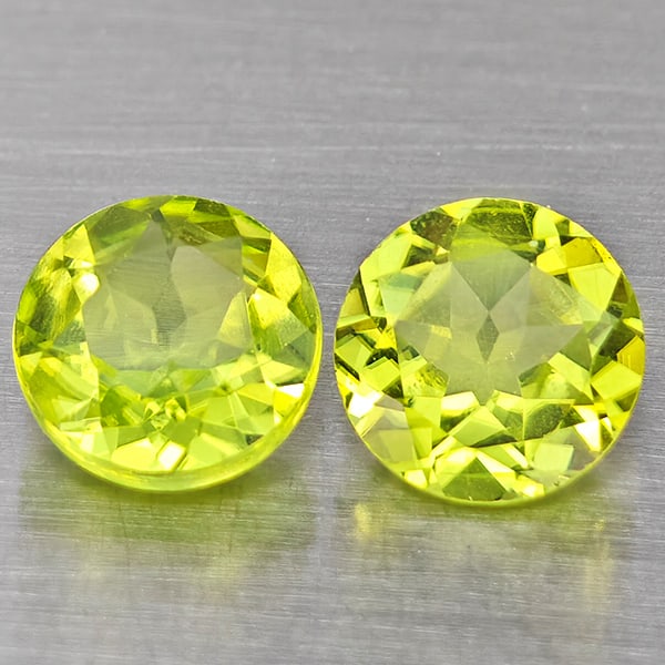 Natural Green Peridot Gemstones 1.16 Ct. 2 Pcs. Round Shape 5.1 Mm.: Product ID: 805317588 Product Name: Natural Peridot Weight: 1.16 CT. Size: 5.1 x 5.1 x 3.3 MM. Shape: Round Color: Green Clarity:VSI Luster: Good Gems Origin: Pakistan Treatment: Unheated Crystal Stru