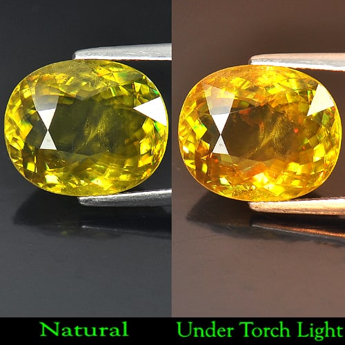 Natural Intense Yellowish Green Titanium Sphene With Red Spark 9.27 Ct. Oval Shape: Product ID: 806505792 Product Name: Natural Sphene Weight: 9.27 CT. Size: 14.8 x 12.3 x 6.4 MM. Shape: Oval Color: Intense Yellowish Green Titanium With Red Sap Clarity:SI Luster: Adamantine Gems Orig