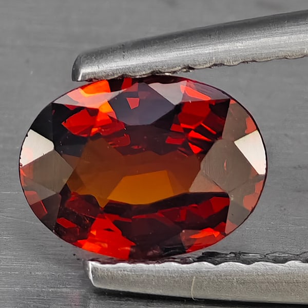 Natural Reddish Orange Spessartine Garnet Gemstones 0.70 Ct. Oval Shape 7 x 5 Mm.: Product ID: 802936380 Product Name: Natural Spessartine Weight: 0.70 CT. Size: 7 x 5 x 2.4 MM. Shape: Oval Color: Orange Clarity:VSI Luster: Good Gems Origin: Nigeria Treatment: Unheated Crystal Struc