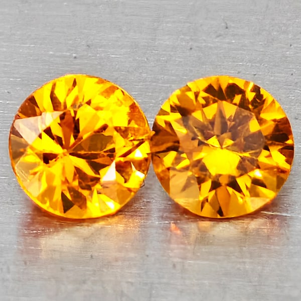 Natural Orange Yellow Sapphire Gemstones 0.22 Ct. 2 Pcs Round Diamond Cut 2.9 Mm.: Product ID: 806162864 Product Name: Natural Yellow Sapphire Weight: 0.22 CT. Size: 2.9 x 2.9 x 1.8 MM. Shape: Round Diamond Cut Color: Orange Yellow Clarity:VSI Luster: Good Gems Origin: Thailand Trea