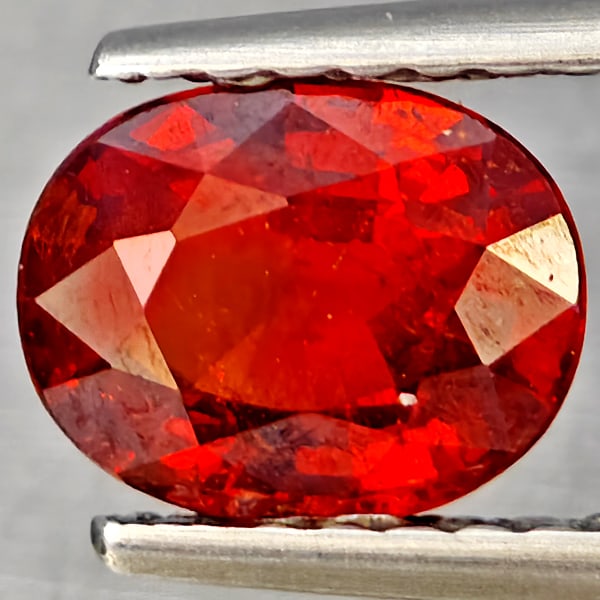 Natural Orangish Red Spessartine Garnet Gemstones 1.22 Ct. Oval Shape 7 x 5.5 Mm.: Product ID: 802937400 Product Name: Natural Garnet Weight: 1.22 CT. Size: 7 x 5.5 x 3.5 MM. Shape: Oval Shape Color: Orangish Red Clarity:SI1 Luster: Good Gems Origin: Namibia Treatment: Unheated Crys