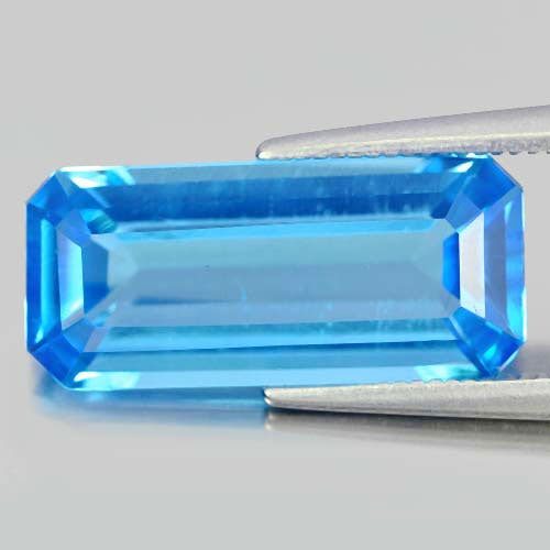 Natural Swiss Blue Topaz Gemstones 7.10 Ct. Octagon 17 x 7.6 Mm.: Product ID: 807148405 Product Name: Natural Blue Topaz Weight: 7.10 CT. Size: 17 x 7.6 x 5.1 MM. Shape: Octagon Color: Swiss Blue Clarity:VS Luster: Very Good Gems Origin: Brazil Treatment: Treated Cr