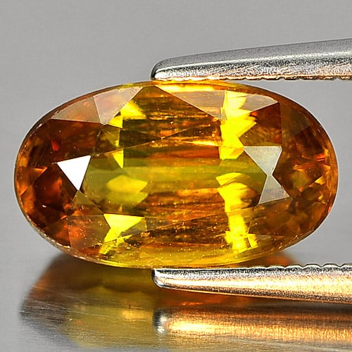 Natural Multi Color Titanium Sphene With Rainbow Spark 2.57 Ct. Oval Shape: Product ID: 806505757 Product Name: Natural Sphene Weight: 2.57 CT. Size: 10.7 x 6.2 x 4.5 MM. Shape: Oval Color: Multi-Color Clarity:SI1 Luster: Adamantine Gems Origin: Madagascar Treatment: Unheated