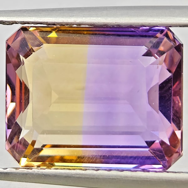 Natural Bi Color Ametrine Gemstones 5.73 Ct. Octagon Shape 12.2 x 9.8 Mm.: Product ID: 800408630 Product Name: Natural Ametrine Weight: 5.73 CT. Size: 12.2 x 9.8 x 5.9 MM. Shape: Octagon Color: Bi Color Clarity:VSI Luster: Good Gems Origin: Bolivia Treatment: Unheated Crysta