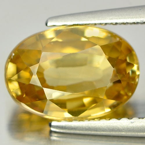 Natural Yellow Zircon Gemstones 4.69 Ct. Oval Shape 10.5 x 7.5 Mm.: Product ID: 807729049 Product Name: Natural Zircon Weight: 4.69 CT. Size: 10.5 x 7.5 x 5 MM. Shape: Oval Color: Yellow Clarity:VSI Luster: Good Gems Origin: Cambodia Treatment: Heated Crystal Structur