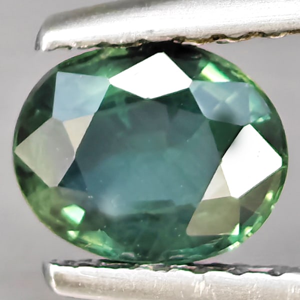 Natural Green Sapphire Gemstones 0.86 Ct. Oval Shape 6.3 x 5.3 Mm.: Product ID: 806162993 Product Name: Natural Green Sapphire Weight: 0.86 CT. Size: 6.3 x 5.3 x 3.1 MM. Shape: Oval Shape Color: Green Clarity:SI1 Luster: Good Gems Origin: Thailand Treatment: Heated Cr