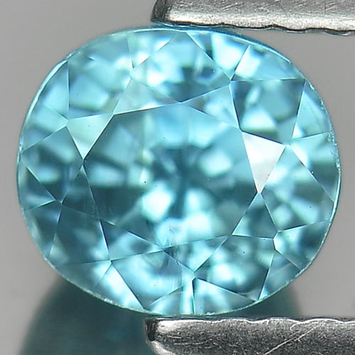Natural Blue Zircon Gemstones 1.93 Ct. Oval Shape 6.1 x 5.5 Mm.: Product ID: 807713133 Product Name: Natural Zircon Weight: 1.93 CT. Size: 6.1 x 5.5 x 5.4 MM. Shape: Oval Color: Blue Clarity:VSI Luster: Good Gems Origin: Cambodia Treatment: Heated Crystal Structure