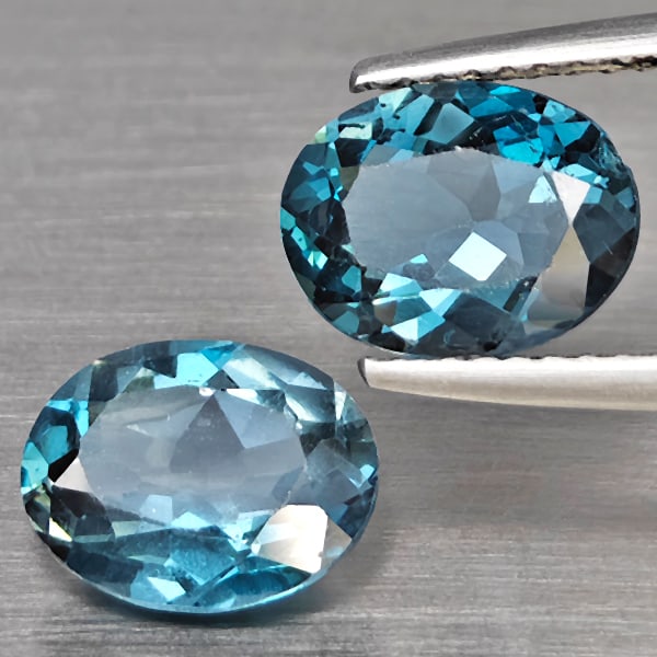 Natural London Blue Topaz Gemstones 4.08 Ct. 2 Pcs. Oval Shape 9.2 x 7.3 Mm.: Product ID: 807168916 Product Name: Natural Blue Topaz Weight: 4.08 CT. Size: 9.2 x 7.3 x 4.3 MM. Shape: Oval Color: London Blue Clarity:SI1 Luster: Good Gems Origin: Brazil Treatment: Treated Crystal