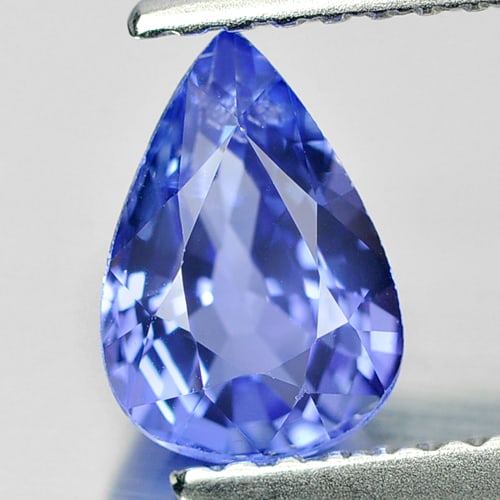 Natural Blue Tanzanite Gemstones 1.00 Ct. Clean Pear Shape 7.9 x 5.4 Mm.: Product ID: 807006055 Product Name: Natural Tanzanite Weight: 1.00 CT. Size: 7.9 x 5.4 x 3.7 MM. Shape: Pear Color: Violetish Blue Clarity:IF Luster: Very Good Gems Origin: Tanzania Treatment: Heated 
