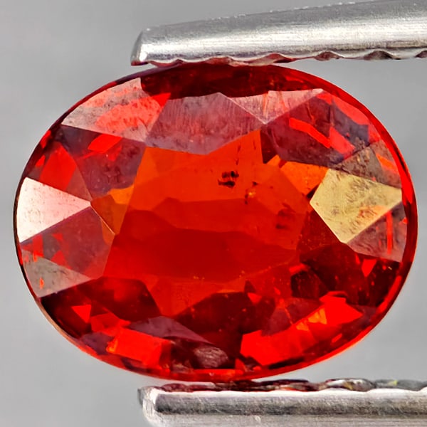 Natural Orangish Red Spessartine Garnet Gemstones 0.95 Ct. Oval Shape 6.7 x 5.3 Mm.: Product ID: 802937385 Product Name: Natural Garnet Weight: 0.95 CT. Size: 6.7 x 5.3 x 2.9 MM. Shape: Oval Shape Color: Orangish Red Clarity:SI1 Luster: Good Gems Origin: Namibia Treatment: Unheated Cr