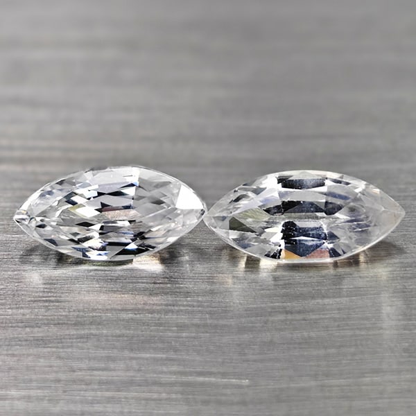 Natural White Color Zircon Gemstones 1.60 Ct. 2 Pcs. Marquise Shape 7.8 x 3.8 Mm.: Product ID: 807742950 Product Name: Natural Zircon Weight: 1.60 CT. Size: 7.8 x 3.8 x 3.1 MM. Shape: Marquise Color: White Clarity:VSI Luster: Good Gems Origin: Cambodia Treatment: Heated Crystal Stru