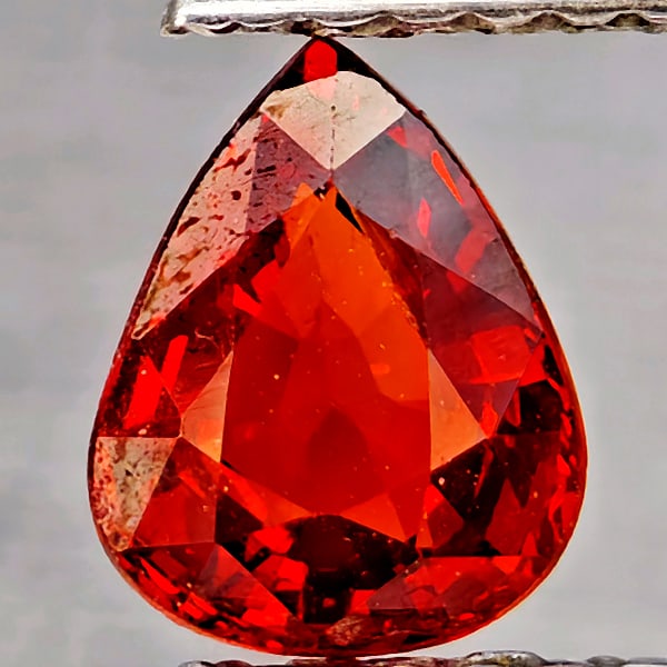 Natural Orangish Red Spessartine Garnet Gemstones 0.93 Ct. Pear Shape 6.5 x 5.1 Mm.: Product ID: 802937344 Product Name: Natural Garnet Weight: 0.93 CT. Size: 6.5 x 5.1 x 3.2 MM. Shape: Pear Shape Color: Orangish Red Clarity:SI1 Luster: Good Gems Origin: Namibia Treatment: Unheated Cr