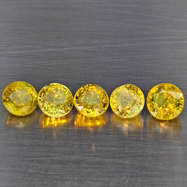 Natural Greenish Yellow Titanium Sphene Gemstones Rainbow Spark 1.66 Ct. 5 Pcs. Round Shape 4.1 Mm.: Product ID: 806509399 Product Name: Natural Sphene Weight: 1.66 CT. Size: 4.1 x 4.1 x 2.6 MM. Shape: Round Color: Greenish Yellow Clarity:SI1 Luster: Good Gems Origin: Madagascar Treatment: Unheated C