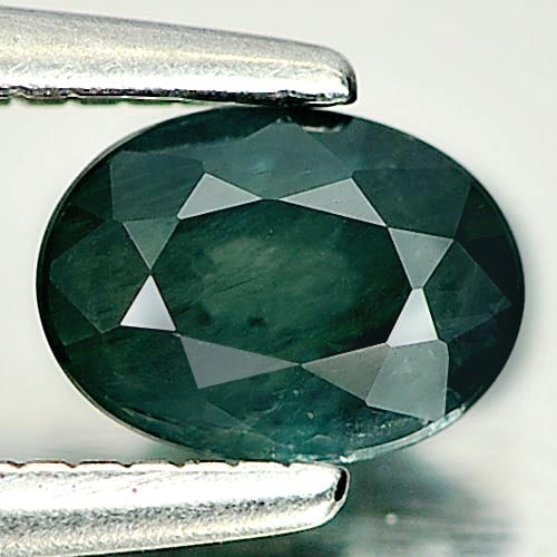 Natural Green Sapphire Gemstones 0.47 Ct. Oval Shape 5.5 x 4.1 Mm.: Product ID: 806157857 Product Name: Natural Green Sapphire Weight: 0.47 CT. Size: 5.5 x 4.1 x 2.5 MM. Shape: Oval Color: Green Clarity:VSI Luster: Good Gems Origin: Thailand Treatment: Heated Crystal 