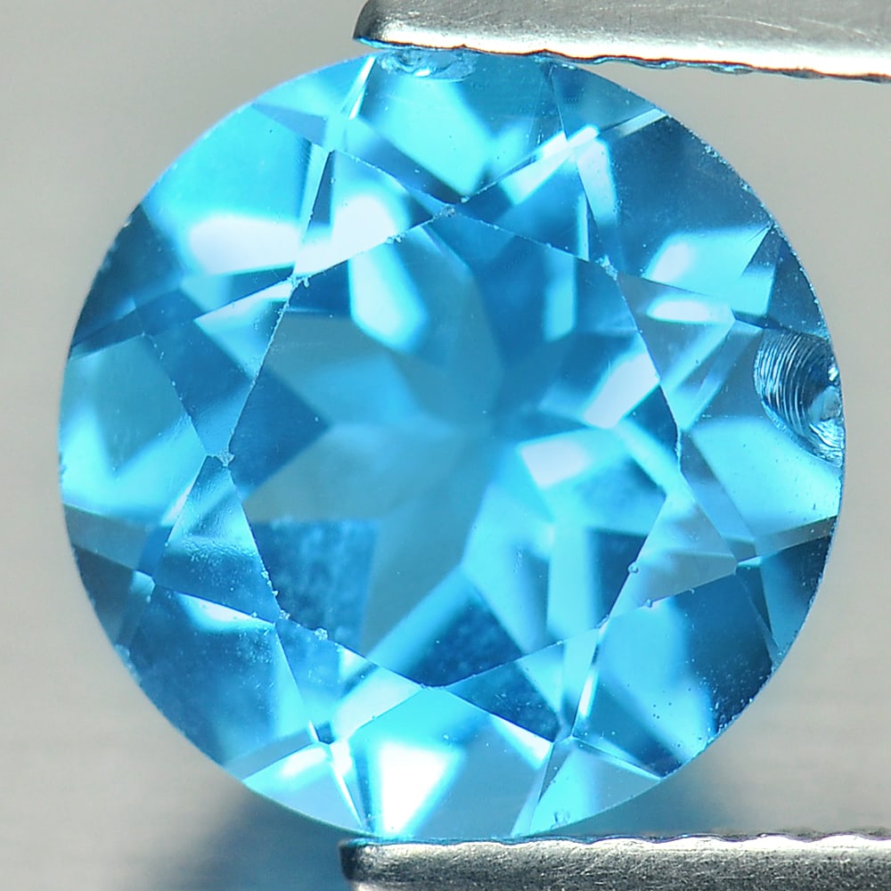 Natural Swiss Blue Topaz Gemstones 2.86 Ct. VVS Round Shape 9.1 Mm.: Product ID: 807156268 Product Name: Natural Blue Topaz Weight: 2.86 CT. Size: 9.1 x 9.1 x 5.2 MM. Shape: Round Color: Swiss Blue Clarity:VVS Luster: Good Gems Origin: Brazil Treatment: Treated Crystal