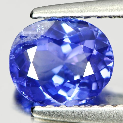 Natural Blue Tanzanite Gemstones 1.05 Ct. Oval Shape 6.9 x 5.9 Mm.: Product ID: 807005358 Product Name: Natural Tanzanite Weight: 1.05 CT. Size: 6.9 x 5.9 x 3.6 MM. Shape: Oval Color: Blue Clarity:SI Luster: Good Gems Origin: Tanzania Treatment: Heated Crystal Structu
