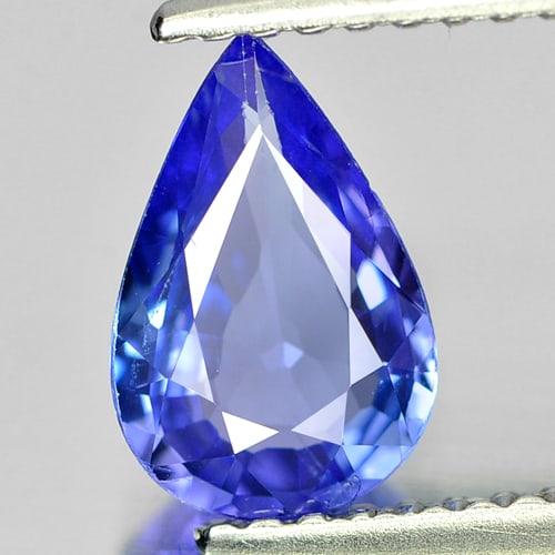 Natural Blue Tanzanite Gemstones 0.94Ct. Pear Shape 8.7 x 5.8 Mm.: Product ID: 807006099 Product Name: Natural Tanzanite Weight: 0.94 CT. Size: 8.7 x 5.8 x 2.9 MM. Shape: Pear Color: Violetish Blue Clarity:VSI Luster: Good Gems Origin: Tanzania Treatment: Heated Crys