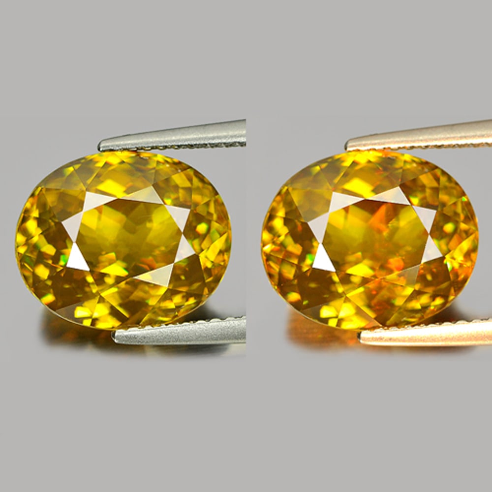 Natural Multi Color Sphene Gemstones 7.70 Ct. Oval Shape 12.5 x 10.3 Mm.: Product ID: 806505168 Product Name: Natural Sphene Weight: 7.70 CT. Size: 12.5 x 10.3 x 7.4 MM. Shape: Oval Color: Multi Color With Red Spark Clarity:VSI Luster: Adamantine Gems Origin: Madagascar Tre