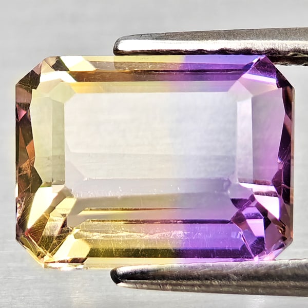 Natural Bi Color Ametrine Gemstones 3.28 Ct. Octagon Shape 10.1 x 8 Mm.: Product ID: 800408341 Product Name: Natural Ametrine Weight: 3.28 CT. Size: 10.1 x 8 x 5.5 MM. Shape: Octagon Color: Bi Color Clarity:VSI Luster: Good Gems Origin: Bolivia Treatment: Unheated Crystal 