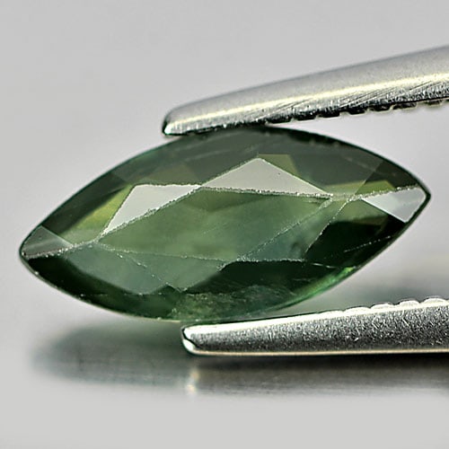 Natural Green Sapphire Gemstones 0.80 Ct. Marquise Shape 9.7 x 4.5 Mm.: Product ID: 806158912 Product Name: Natural Green Sapphire Weight: 0.80 CT. Size: 9.7 x 4.5 x 2.2 MM. Shape: Marquise Color: Green Clarity:SI1 Luster: Good Gems Origin: Thailand Treatment: Heated Crys