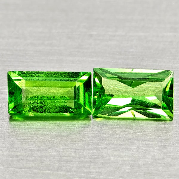 Natural Green Tsavorite Garnet Gemstones 0.79 Ct. 2 Pcs. Baguette Shape 5.5 x 3.4 Mm.: Product ID: 803005030 Product Name: Natural Tsavorite Weight: 0.79 CT. Size: 5.5 x 3.4 x 2 MM. Shape: Baguette Color: Green Clarity:SI1 Luster: Good Gems Origin: Tanzania Treatment: Unheated Crystal S