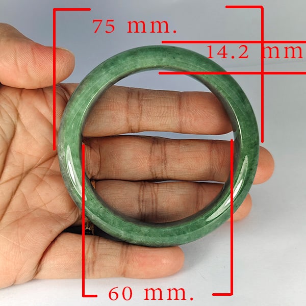 Natural Green Jade Gemstones Bangle 357.74 Ct. Diameter 60 Mm.: Product ID: 819816058 Product Name: Natural Gemstones Weight: 357.74 CT. Size: 75 x 60 x 14.2 MM. Shape: Round Color: Multi-Color Clarity:Opaque Luster: Good Gems Origin: Thailand Treatment: Unheated 