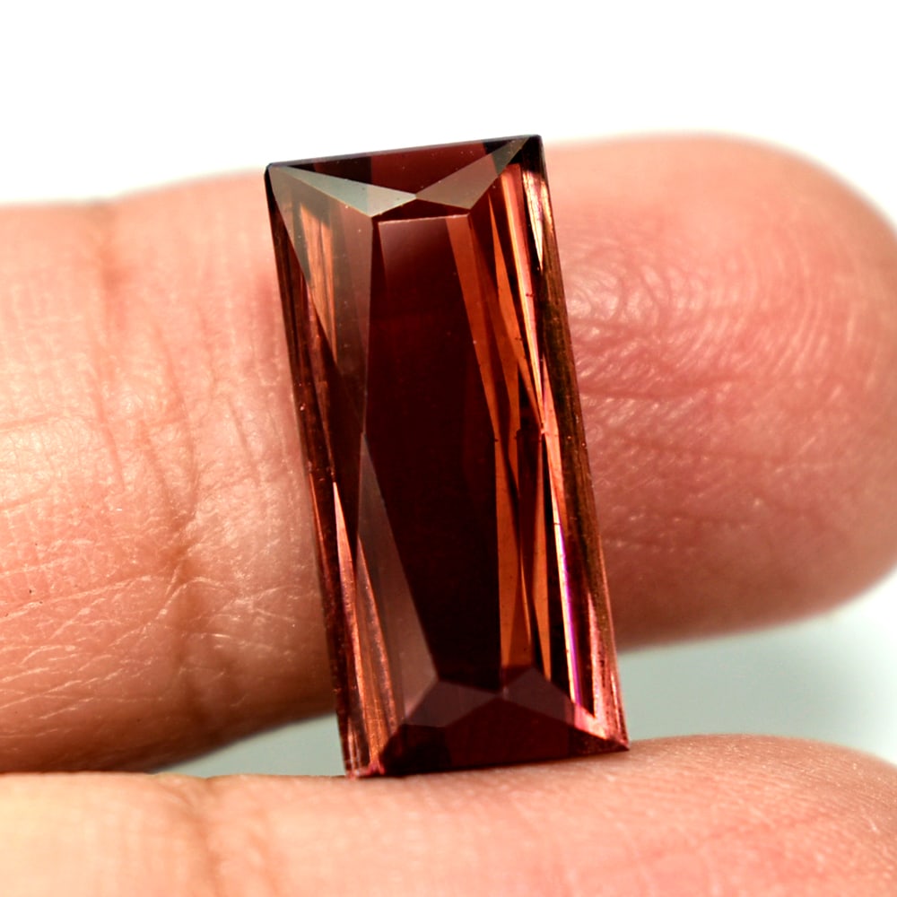 Natural Clean Orangish Pink Tourmaline Gemstones 7.40 Ct. Baguette 17 x 7.8 Mm.: Product ID: 807238286 Product Name: Natural Tourmaline Weight: 7.40 CT. Size: 17 x 7.8 x 5.6 MM. Shape: Baguette Color: Orangish Pink Clarity:IF Luster: Good Gems Origin: Nigeria Treatment: Unheated C