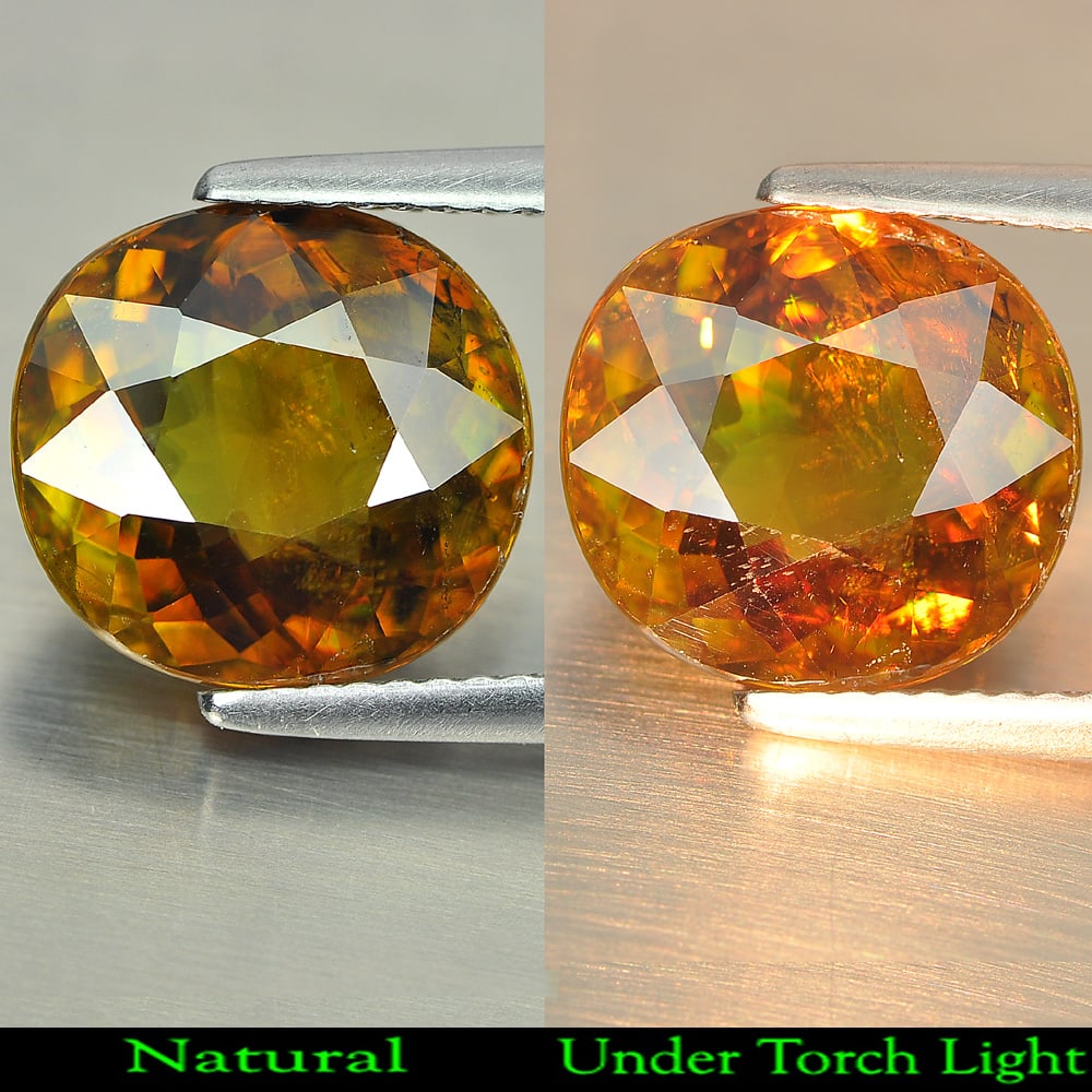 Natural Multi Color Titanium Sphene Rainbow Spark 5.16 Ct. Oval 11.2 x 10.5 Mm.: Product ID: 806507753 Product Name: Natural Sphene Weight: 5.16 CT. Size: 11.2 x 10.5 x 5.5 MM. Shape: Oval Color: Multi Color With Rainbow Spark Clarity:VSI Luster: Good Gems Origin: Madagascar Treat