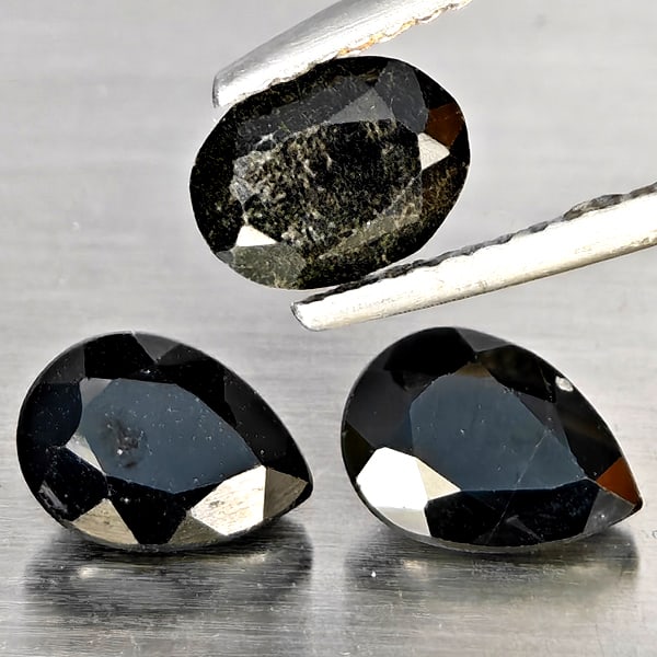 Natural Black Spinel Gemstones 2.63 Ct. 3 Pcs. Mixed Shape: Product ID: 806609921 Product Name: Natural Spinel Weight: 2.63 CT. Size: 6.8 x 5.2 x 3.5 MM. Shape: Mixed Shape Color: Black Clarity:Opaque Luster: Good Gems Origin: Thailand Treatment: Unheated Crys