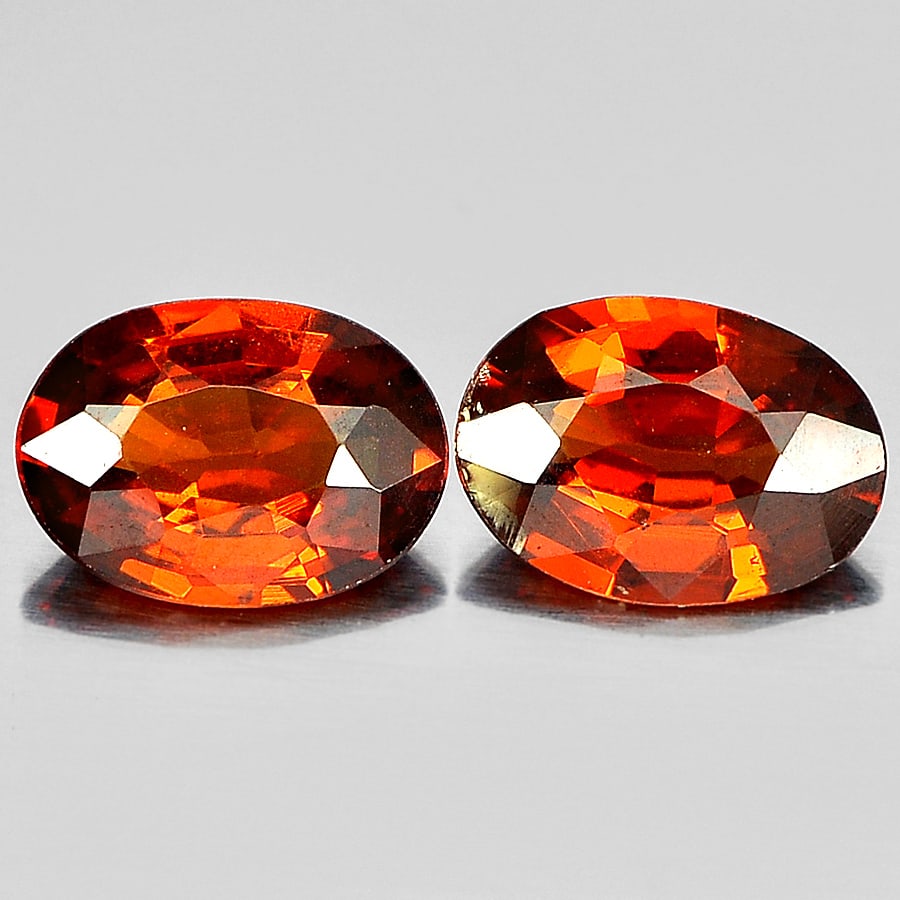 Natural Reddish Orange Spessartine Garnet 1.56 Ct. 2 Pcs. Oval Shape: Product ID: 802936272 Product Name: Natural Spessartine Weight: 1.56 CT. Size: 7 x 5 x 2.7 MM. Shape: Oval Color: Orange Clarity:VSI Luster: Good Gems Origin: Nigeria Treatment: Unheated Crystal Struc