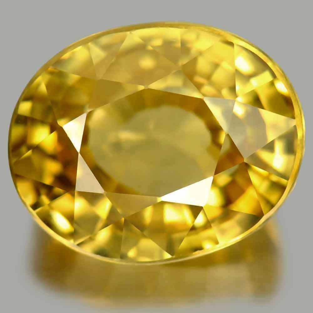 Natural Yellow Zircon Gemstones 12.17 Ct. Oval Shape 12.6 x 10.2 Mm. (1 of 3)