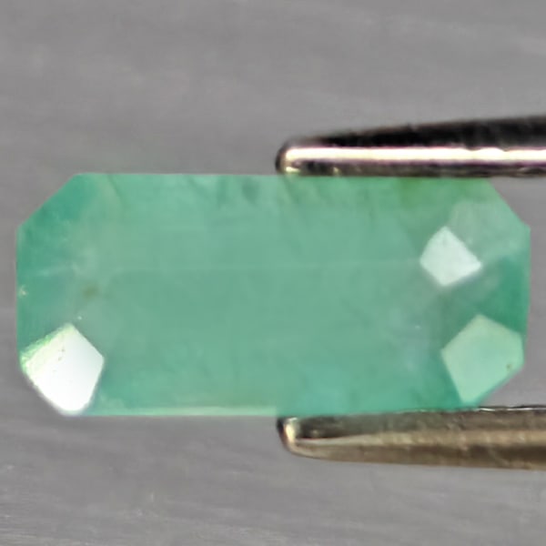 Natural Green Grandidierite Gemstone 1.12 Ct. Octagon Shape 8.4 x 4 Mm.: Product ID: 803100100 Product Name: Natural Tsavorite Weight: 1.12 CT. Size: 8.4 x 4 x 3.2 MM. Shape: Octagon Color: Green Blueish Clarity:SI1 Luster: Good Gems Origin: Madagascar Treatment: Unheated 