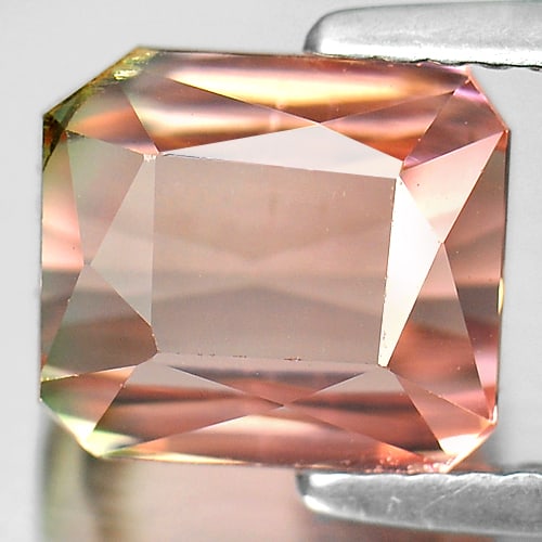Natural Bi Color Tourmaline Gemstones 4.57 Ct. Octagon Shape 8.7 x 7.6 Mm.: Product ID: 807238244 Product Name: Natural Tourmaline Weight: 4.57 CT. Size: 8.7 x 7.6 x 6.9 MM. Shape: Octagon Color: Bi Color Clarity:VSI Luster: Very Good Gems Origin: Nigeria Treatment: Unheated 