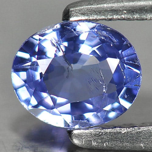 Natural Blue Tanzanite Gemstones 0.50 Ct. Oval Shape 5.8 x 4.8 Mm.: Product ID: 807007764 Product Name: Natural Tanzanite Weight: 0.50 CT. Size: 5.8 x 4.8 x 2.6 MM. Shape: Oval Color: Violetish Blue Clarity:VSI Luster: Good Gems Origin: Tanzania Treatment: Heated Crys