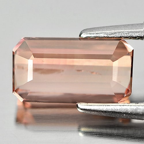 atural Orange Pink Tourmaline Gemstones 1.45 Ct. Octagon Shape 8.7 x 4.8 Mm.: Product ID: 807244132 Product Name: Natural Tourmaline Weight: 1.45 CT. Size: 8.7 x 4.8 x 3.4 MM. Shape: Octagon Color: Orange Pink Clarity:VSI Luster: Good Gems Origin: Nigeria Treatment: Unheated Cr