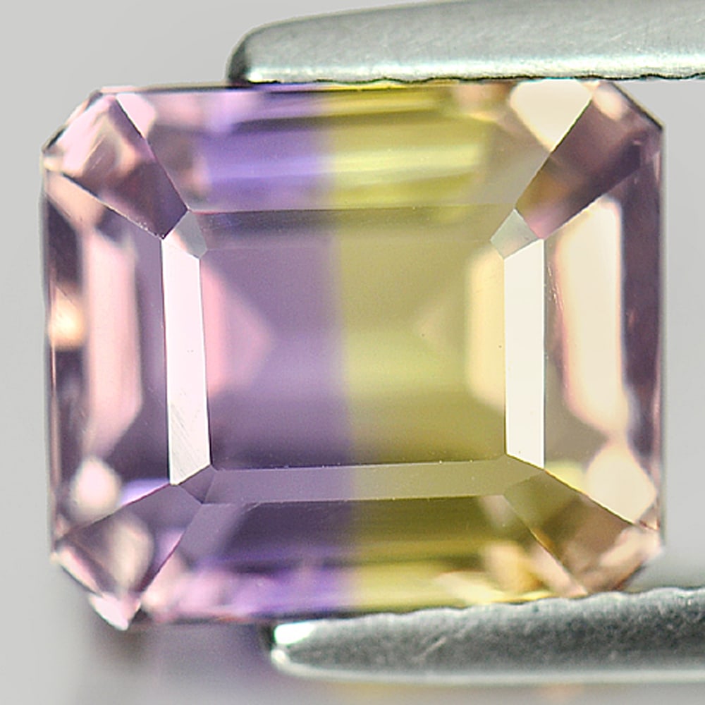 Natural Bi Color Ametrine Gemstones 3.70 Ct. Octagon 9 x 8 Mm.: Product ID: 800405030 Product Name: Natural Ametrine Weight: 3.70 CT. Size: 9 x 8 x 6.4 MM. Shape: Octagon Color: Bi Color Clarity:VVS Luster: Good Gems Origin: Bolivia Treatment: Unheated Crystal Str