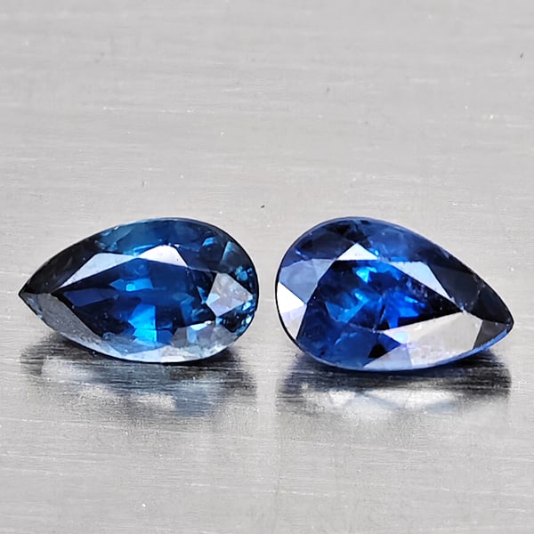 Natural Blue Sapphire Gemstones 0.59 Ct. 2 Pcs. Pear Shape 5.2 x 3 Mm.: Product ID: 806012409 Product Name: Natural Blue Sapphire Weight: 0.59 CT. Size: 5.2 x 3 x 2.5 MM. Shape: Pear Shape Color: Blue Clarity:SI1 Luster: Good Gems Origin: Madagascar Treatment: Heated Crys